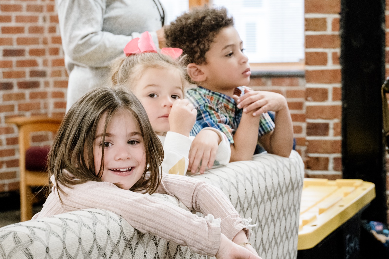 CRWC Kidz children relaxing together during a Sunday activity
